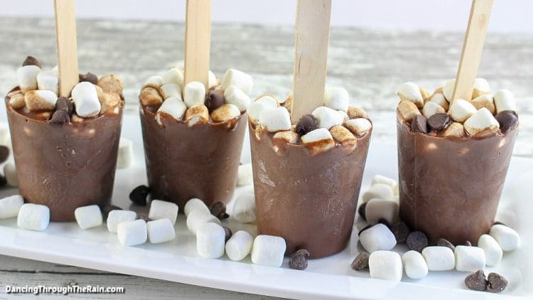 hot chocolate popsicles on sticks with marshmallows and chocolate