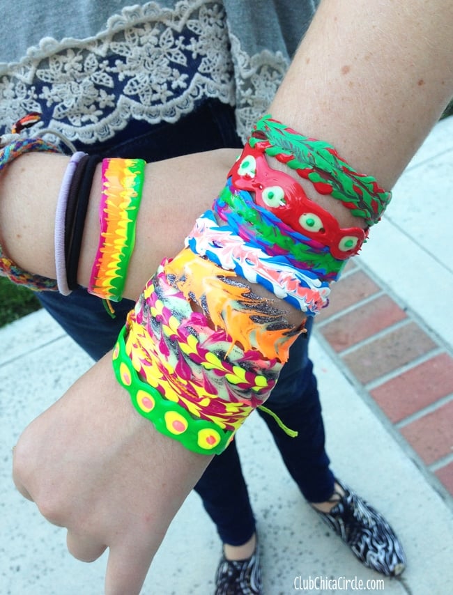 puffy paint friendship bracelets on wrists