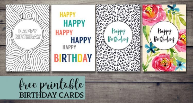 Printable birthday cards laid out on wood table
