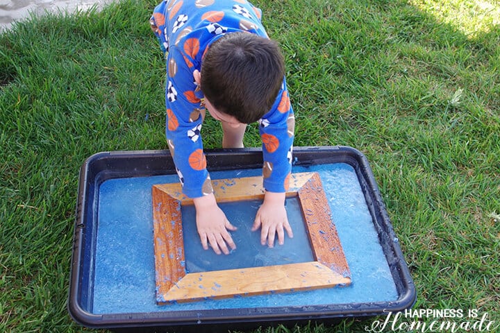 Child making recyclable seed paper