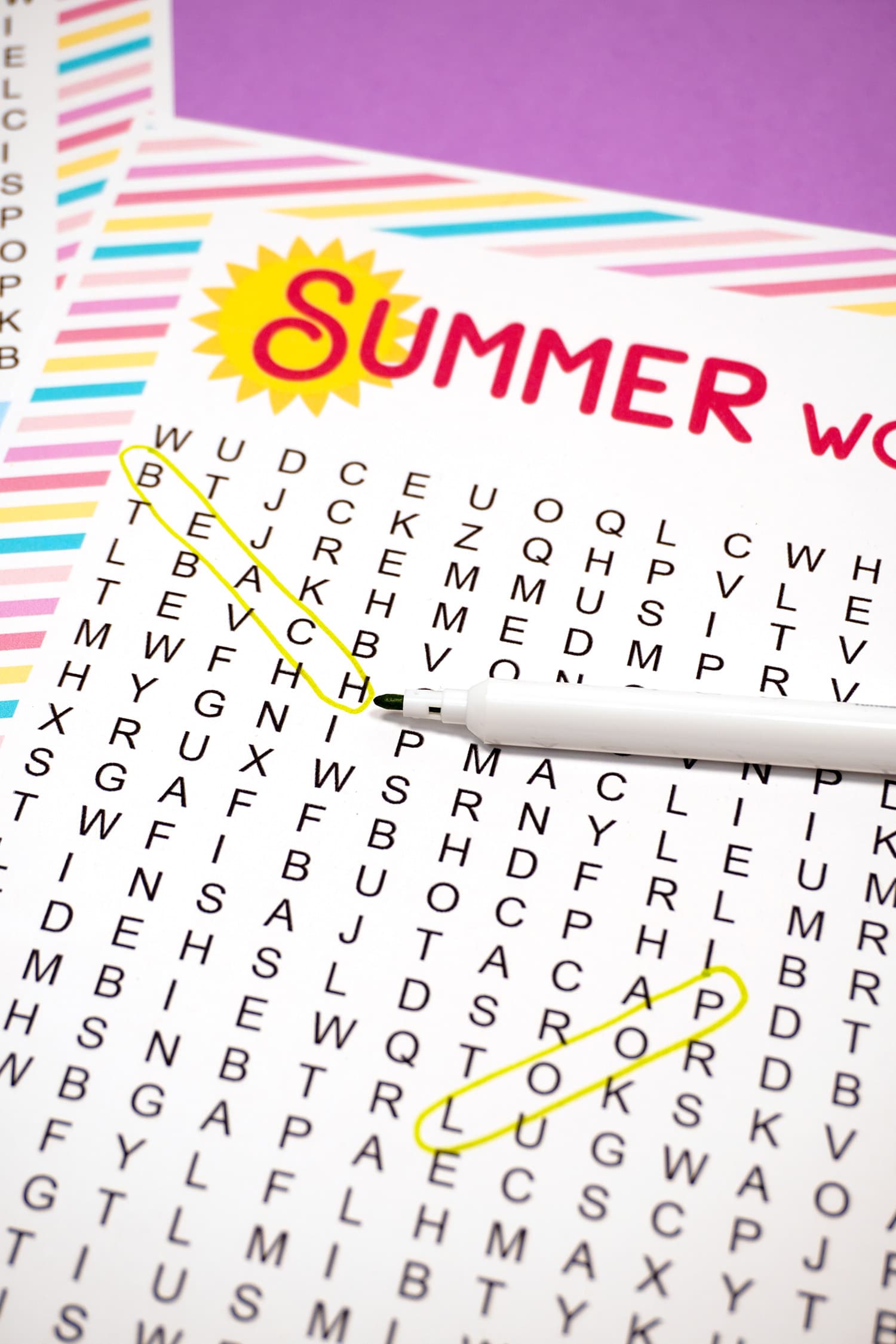 Printable Summer Word Search with "Beach" circled in green marker 