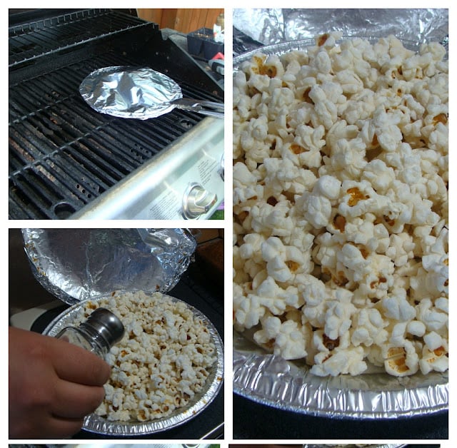 A tin tray of popcorn kernels being popped in a barbeque. 