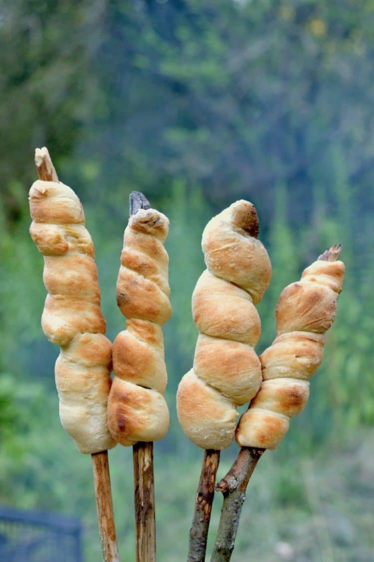 campfire bread baked onto a stick