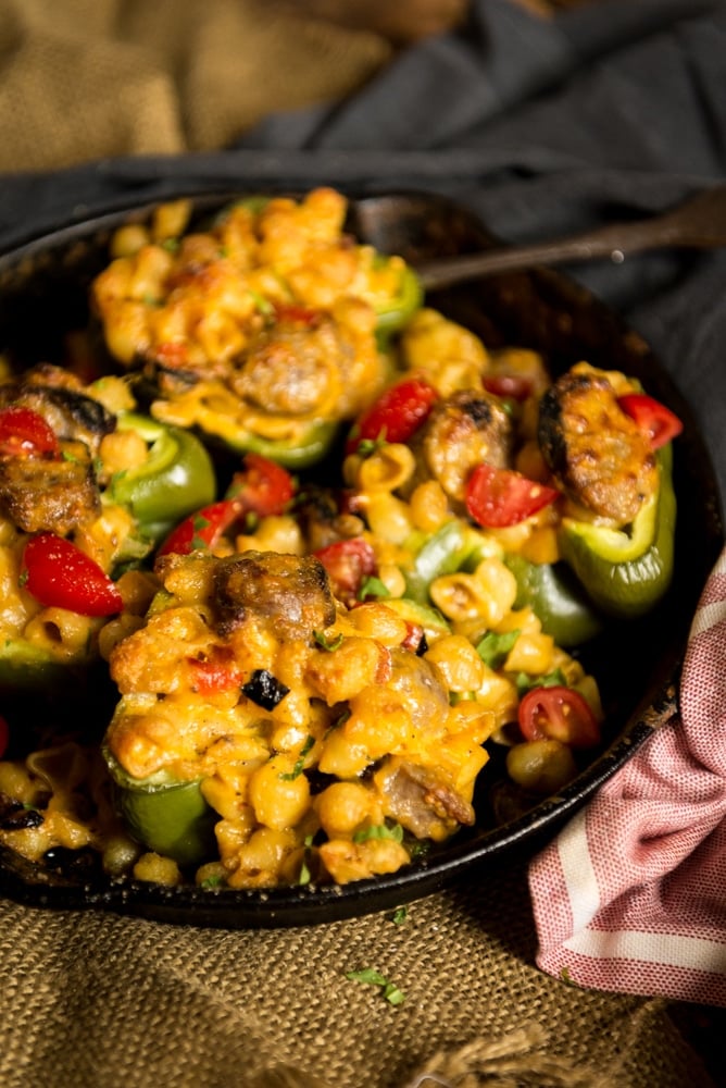 campfire mac and cheese stuffed peppers in a skillet 