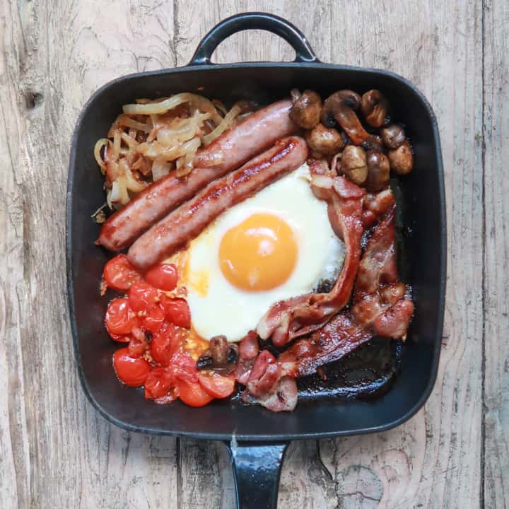 cast iron skillet filled with breakfast items