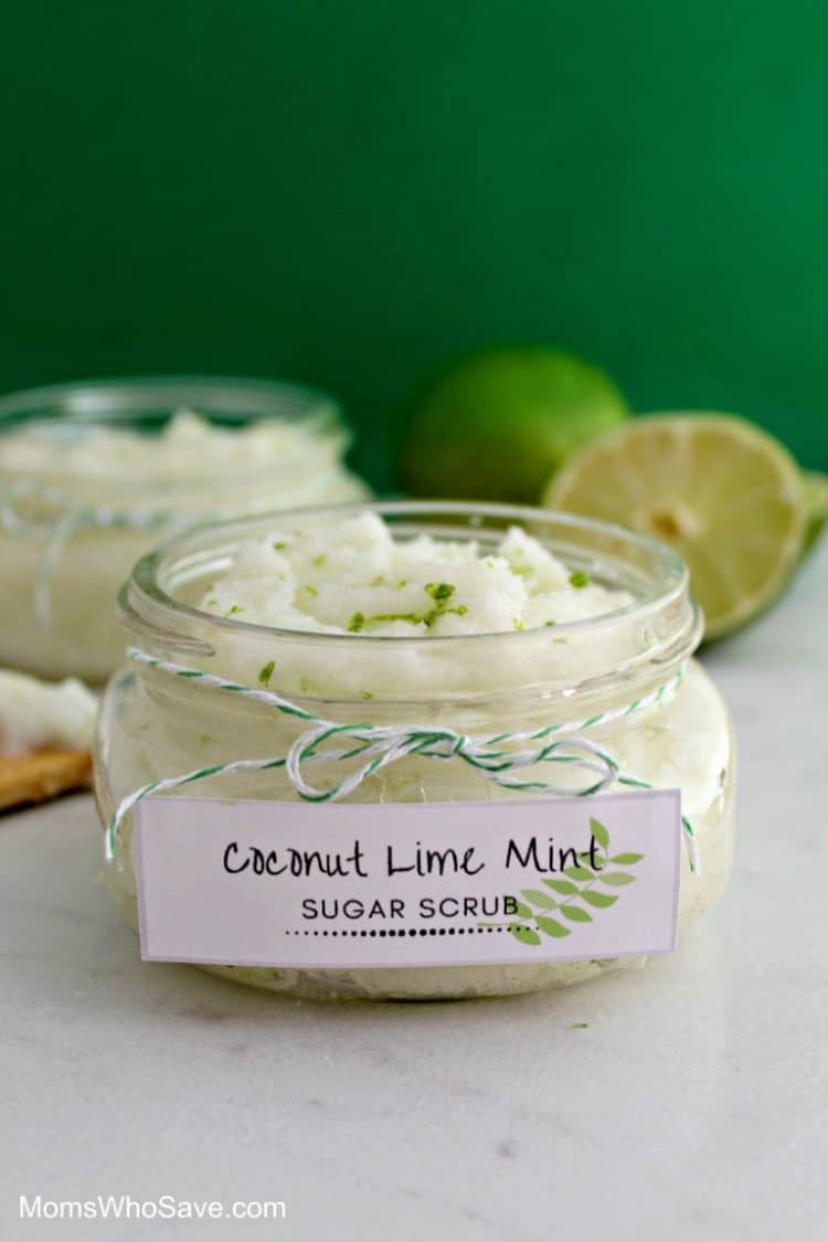 glass jar of coconut lime mint sugar scrub with a label that reads \"coconut lime mint sugar scrub\"
