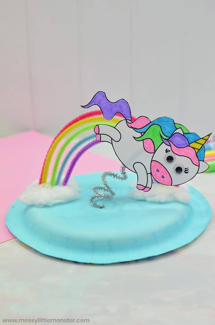 unicorn jumping over a rainbow on paper plate cloud