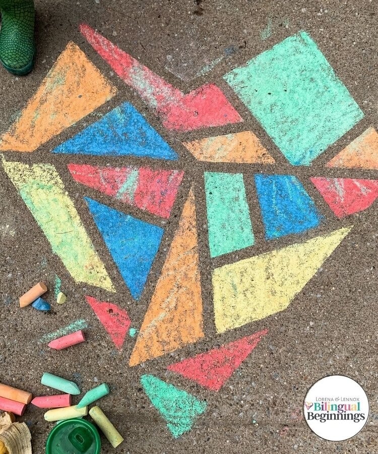 Mosaic heart on sidewalk made from chalk
