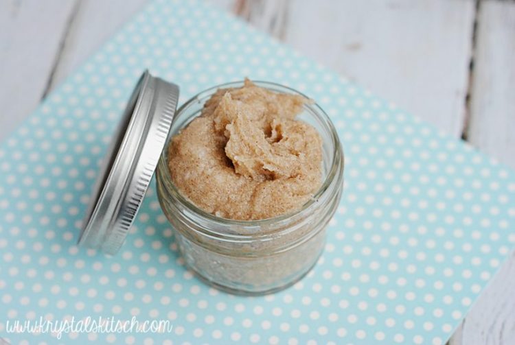 Jar of snickerdoodle sugar scrub on aqua and white polka dot background