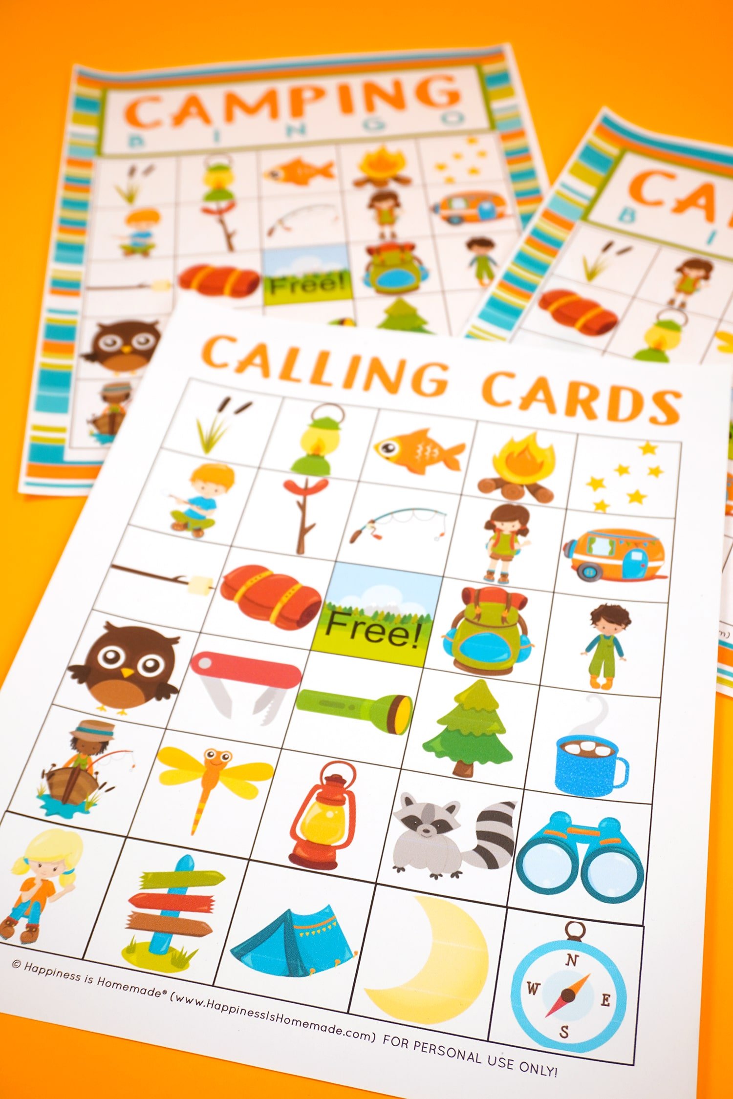 Two Camping Bingo Printable game cards on a n orange background with calling cards