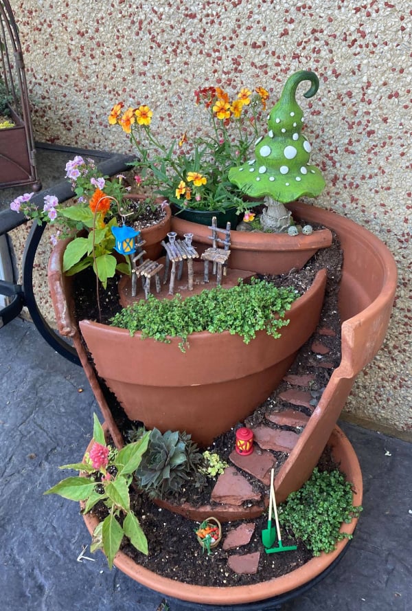 Broken pots made into fairy garden houses