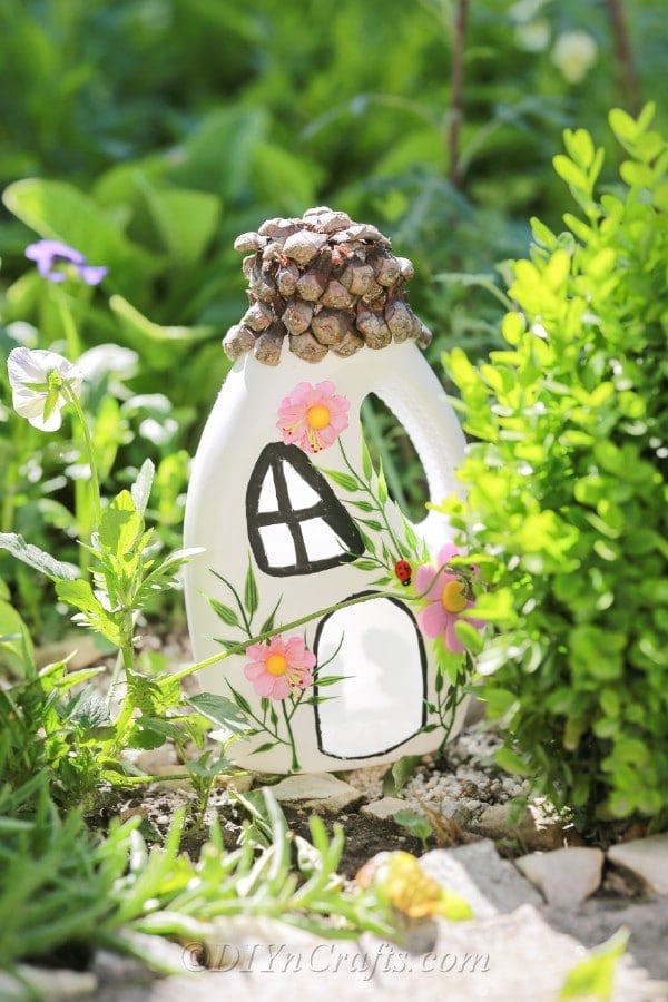 Fairy garden house made from recycled detergent bottle