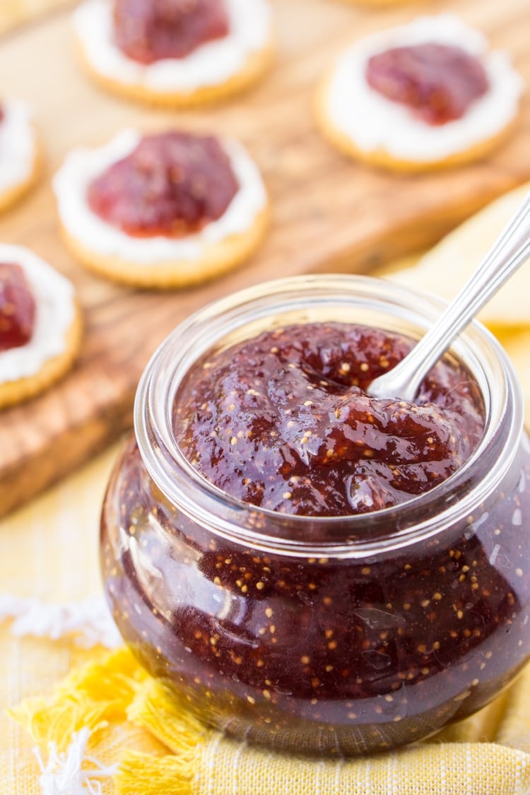 fig jam in container and on crackers