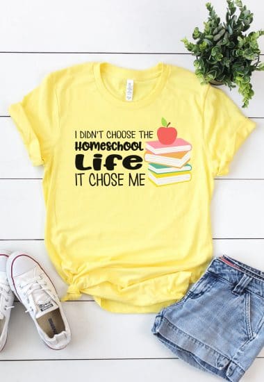 homeschool life svg file on yellow shirt with accessories