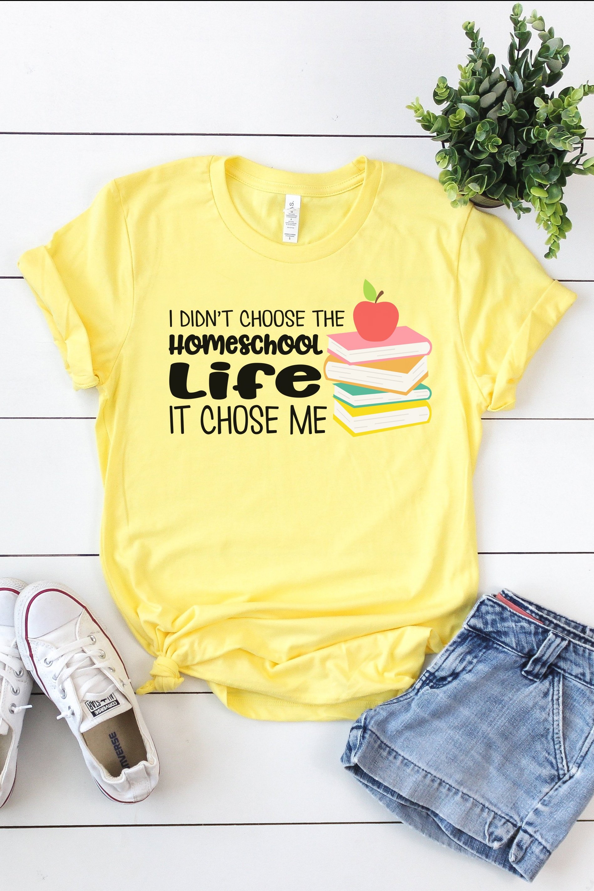 homeschool life svg file on yellow shirt with accessories