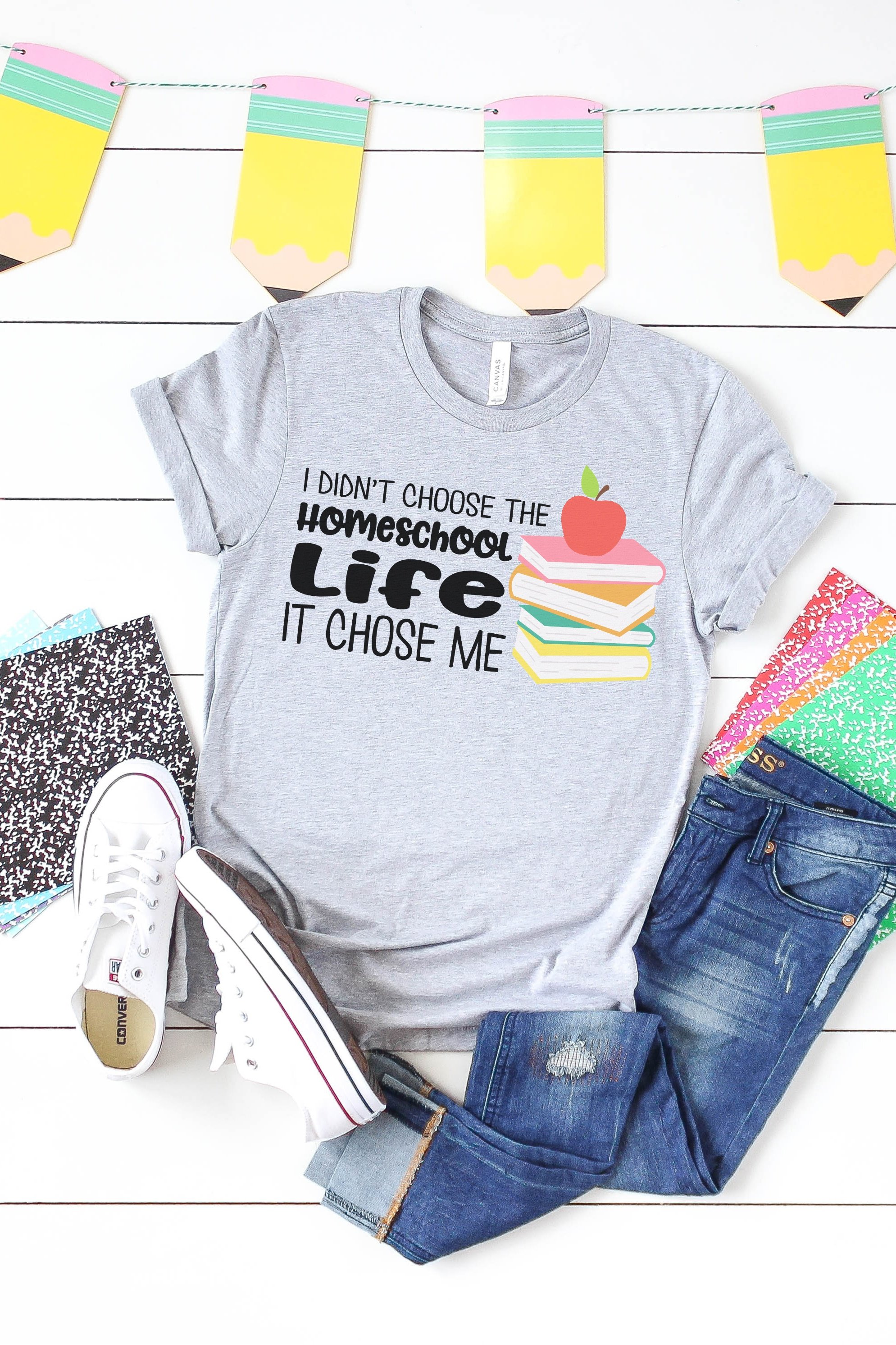 homeschool life svg file on grey shirt with accessories