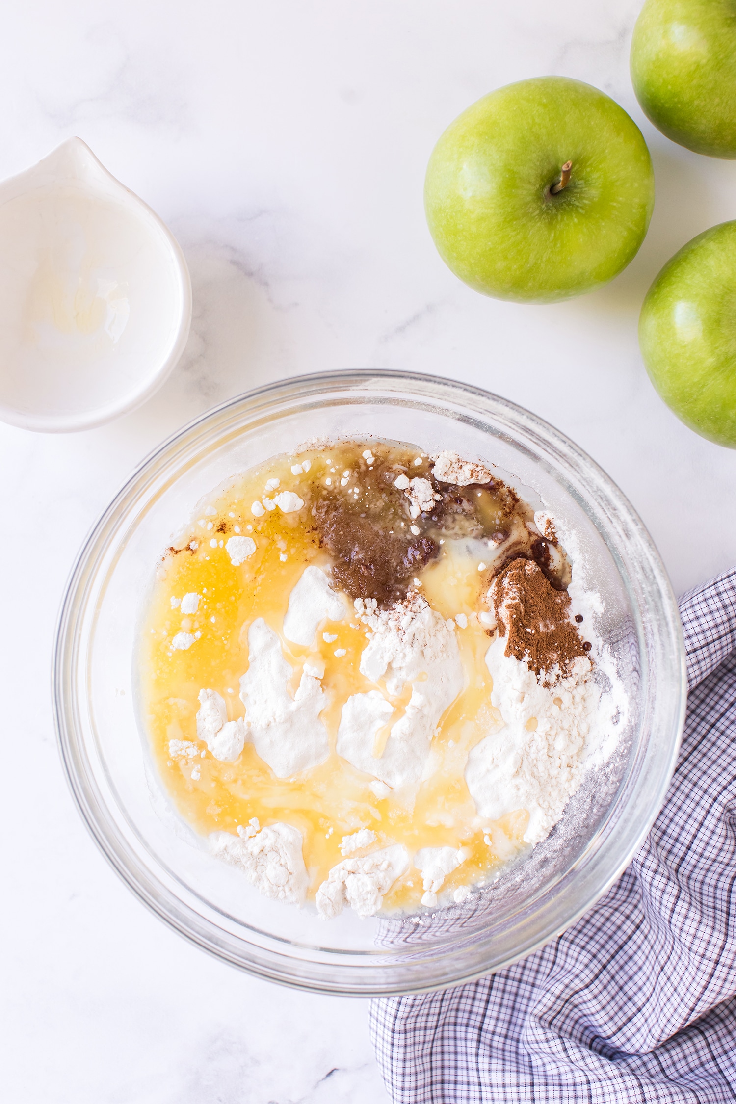 Apple Pie Bar Ingredients in Bowl with green apples on the side