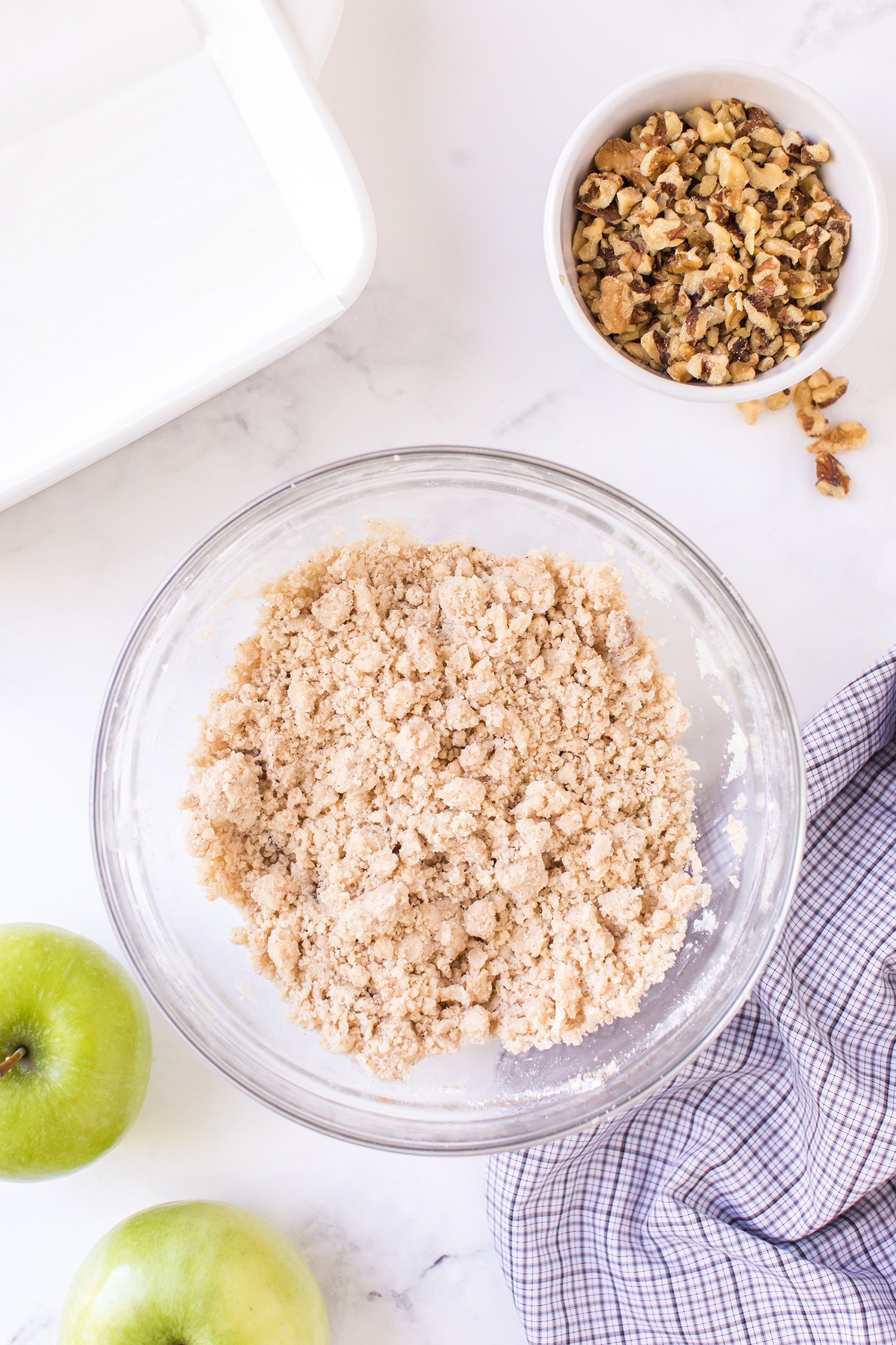 Bowl with apple pie bars crust ingredients