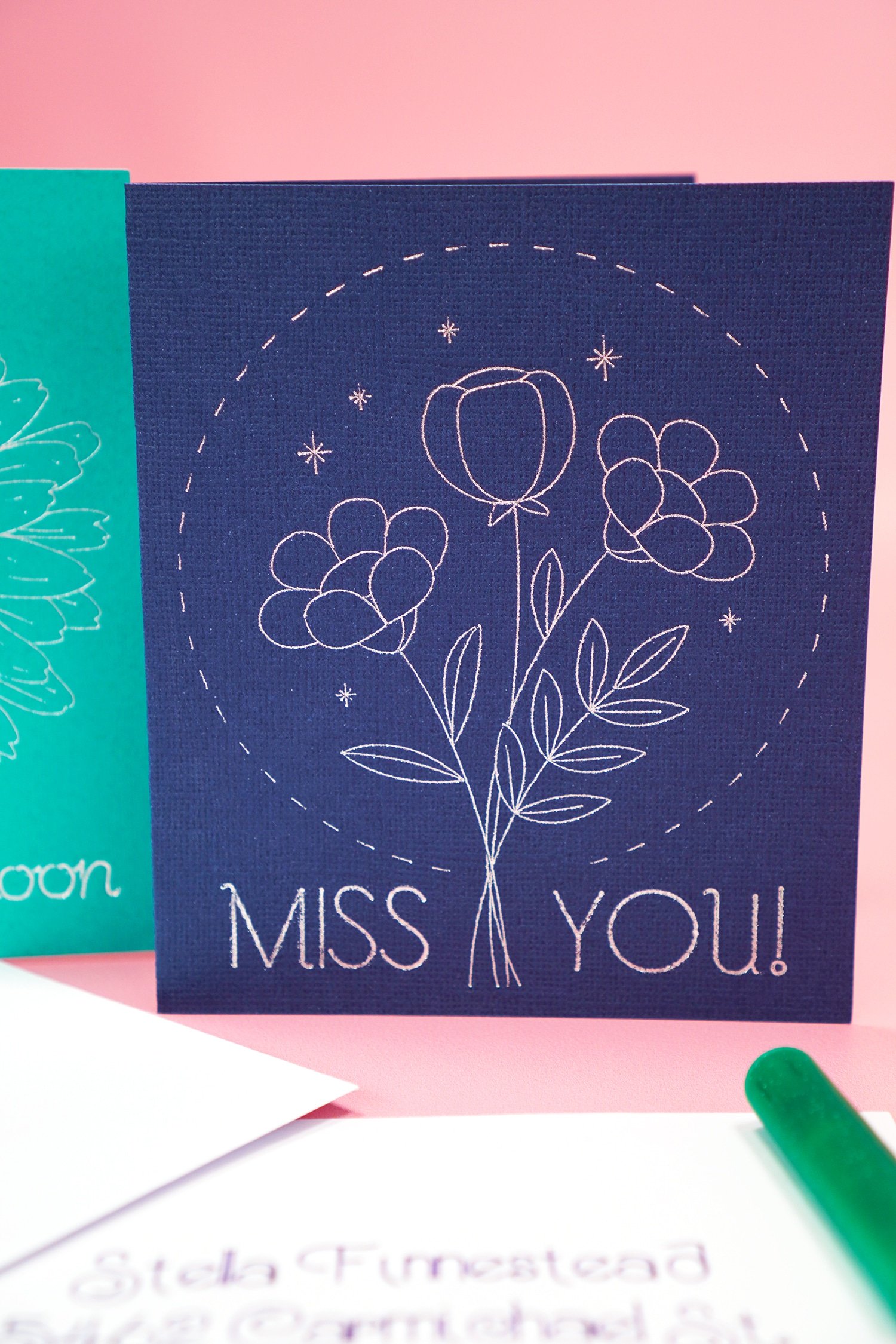 Navy blue "Miss You" card with silver foil