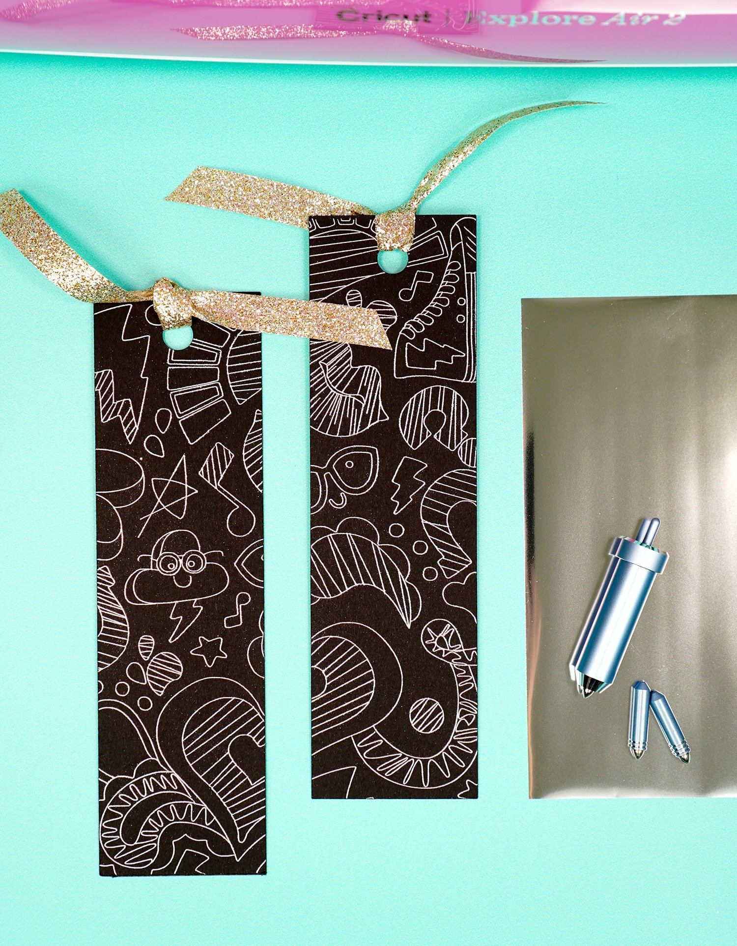 Black and silver foil "doodled" bookmarks with foil sheet and Cricut Foil Transfer tools