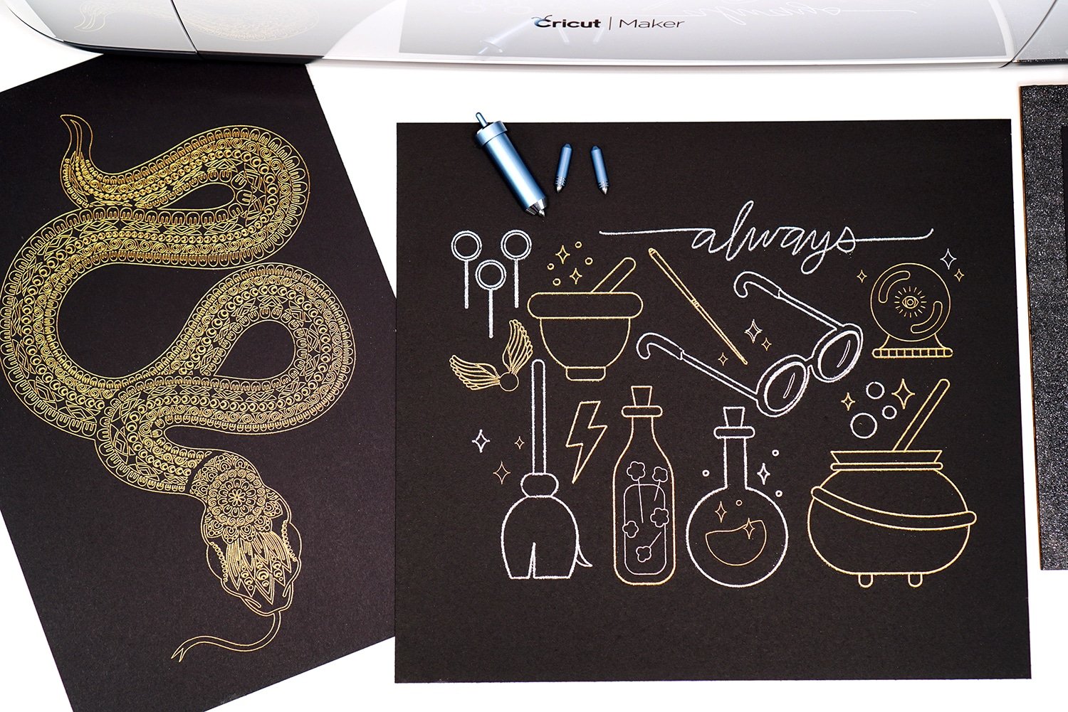 Cricut Maker machine with gold and silver foil art prints (snakes and wizardry) with Cricut Foil Transfer Tool and Tips