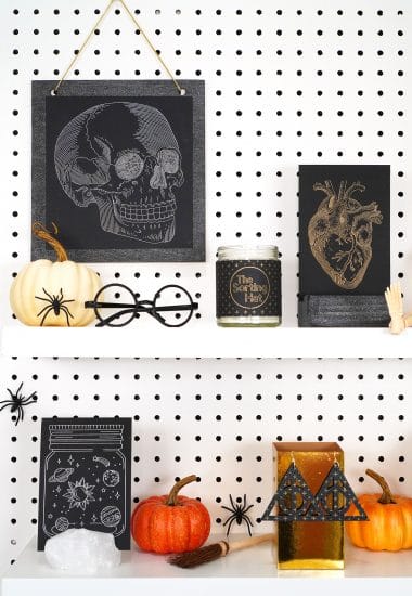 Shelves decorated with Halloween props and Halloween foil art prints