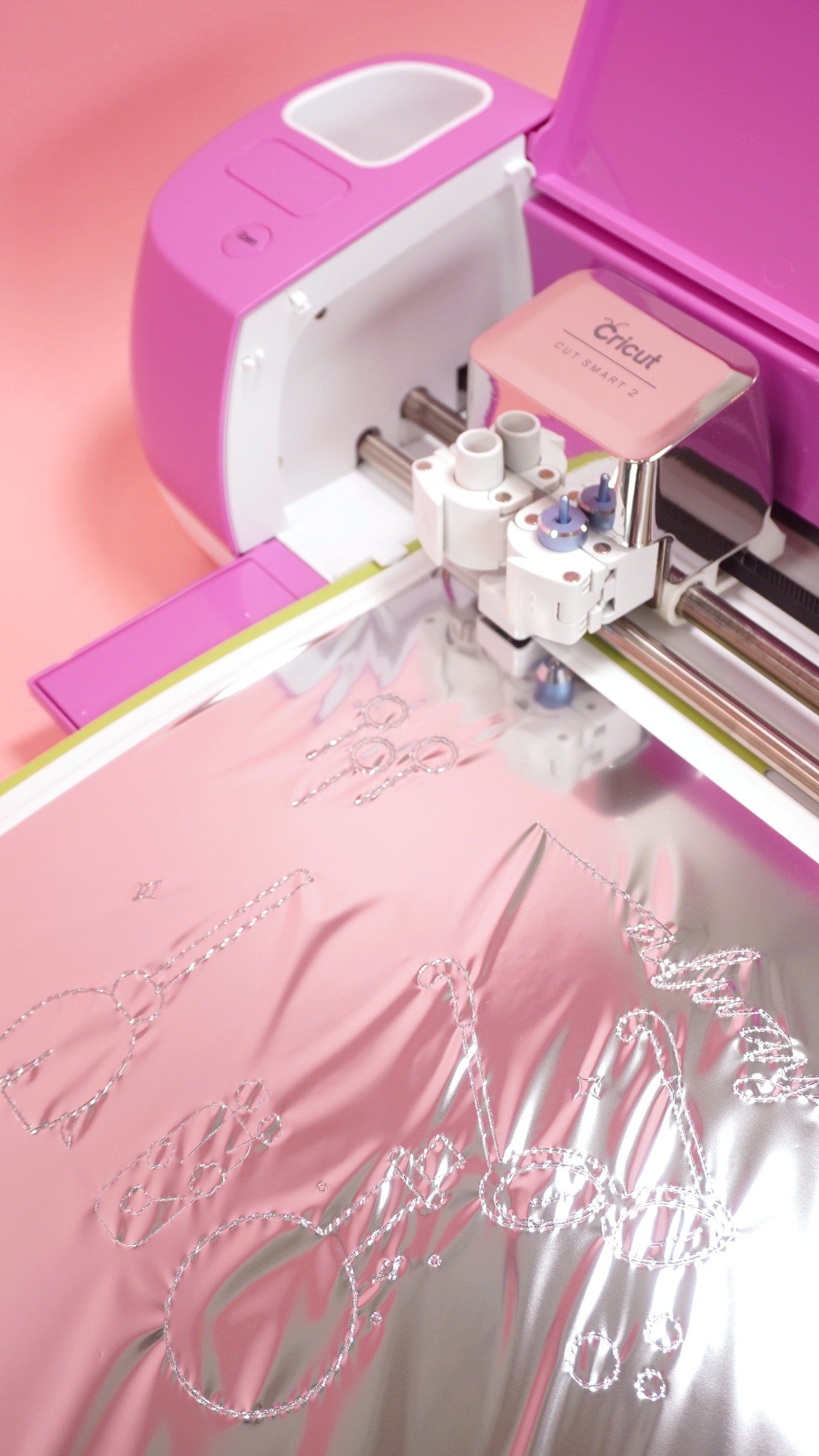 Transferring Silver Foil with Cricut Foil Transfer System on a fuchsia Explore Air 2 machine