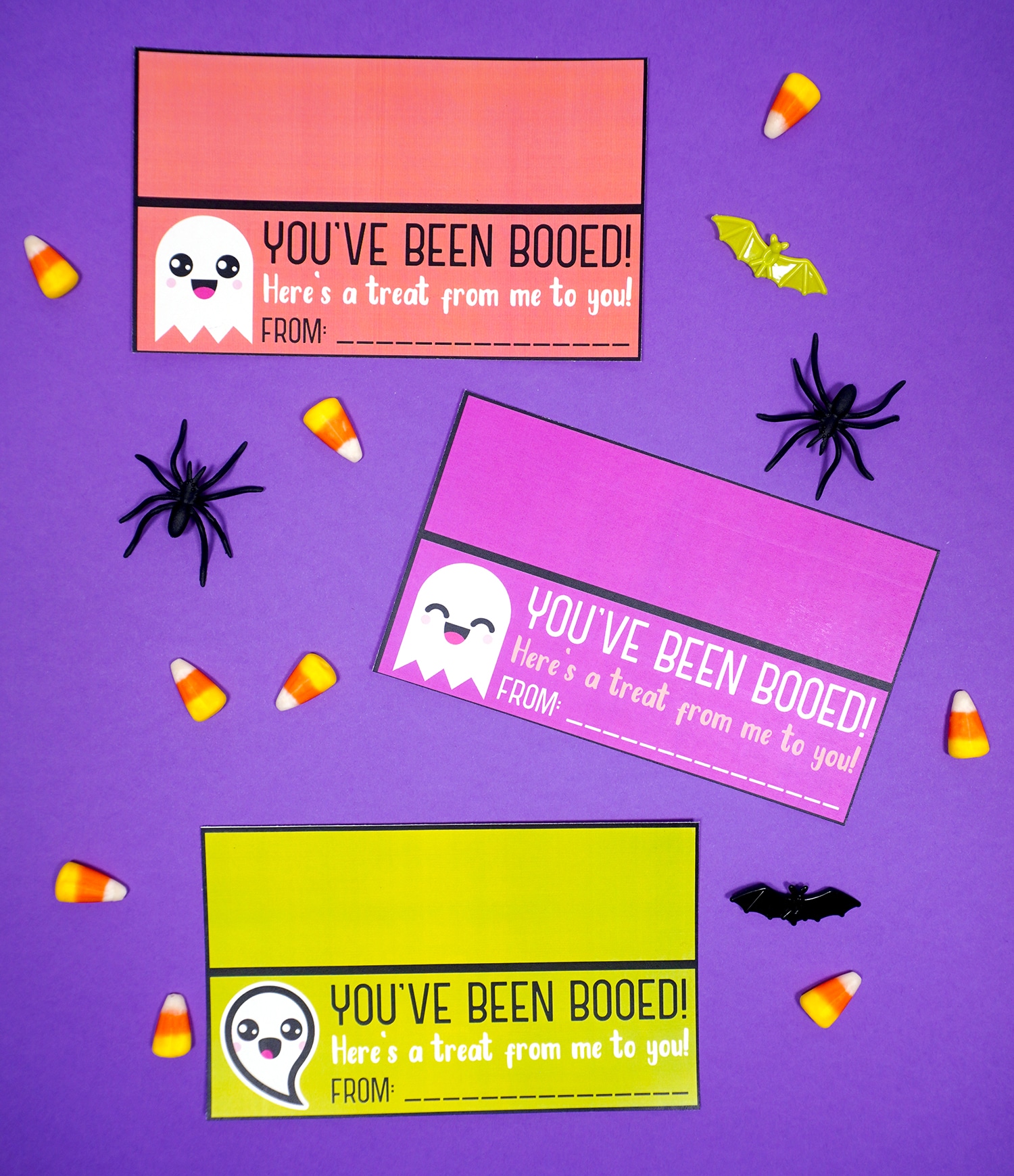 youve been booed printables laid out with halloween decor and candy