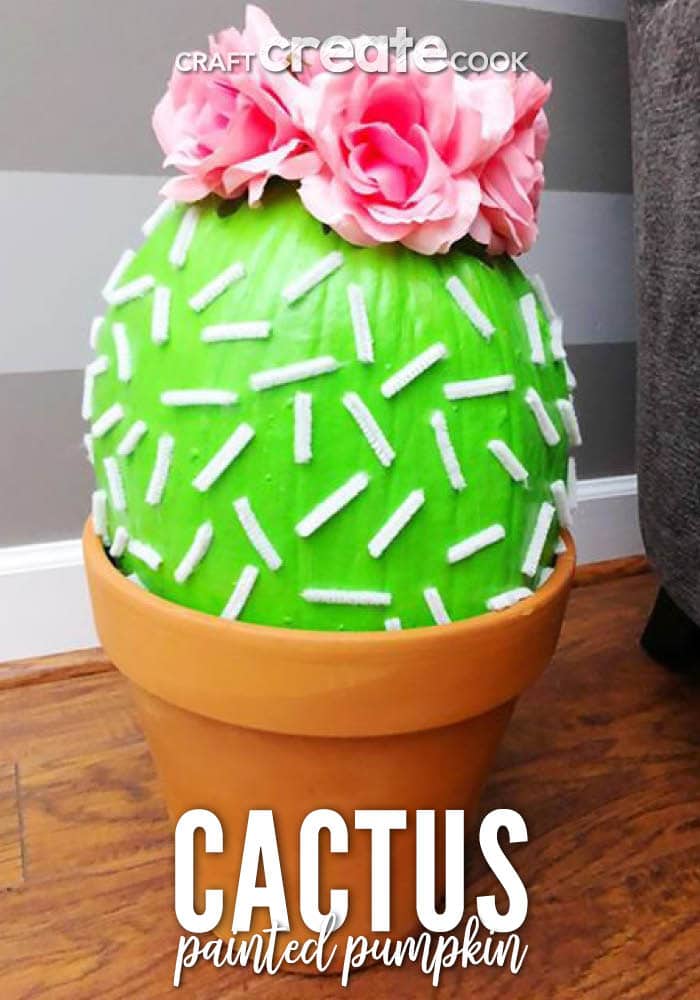 pumpkin in pot decorated like a cactus