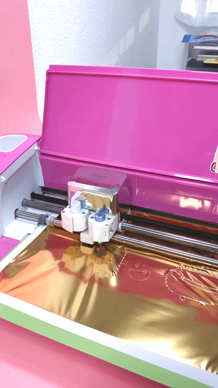 cricut machine in motion cutting foil