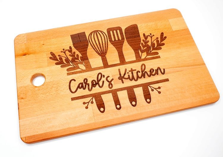 Glowforge Engraved Ikea Cutting Board with "Carol's Kitchen" design on white background