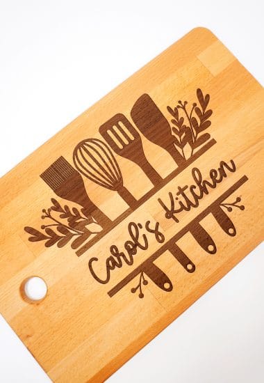 Glowforge Engraved Ikea Cutting Board with "Carol's Kitchen" design on white background