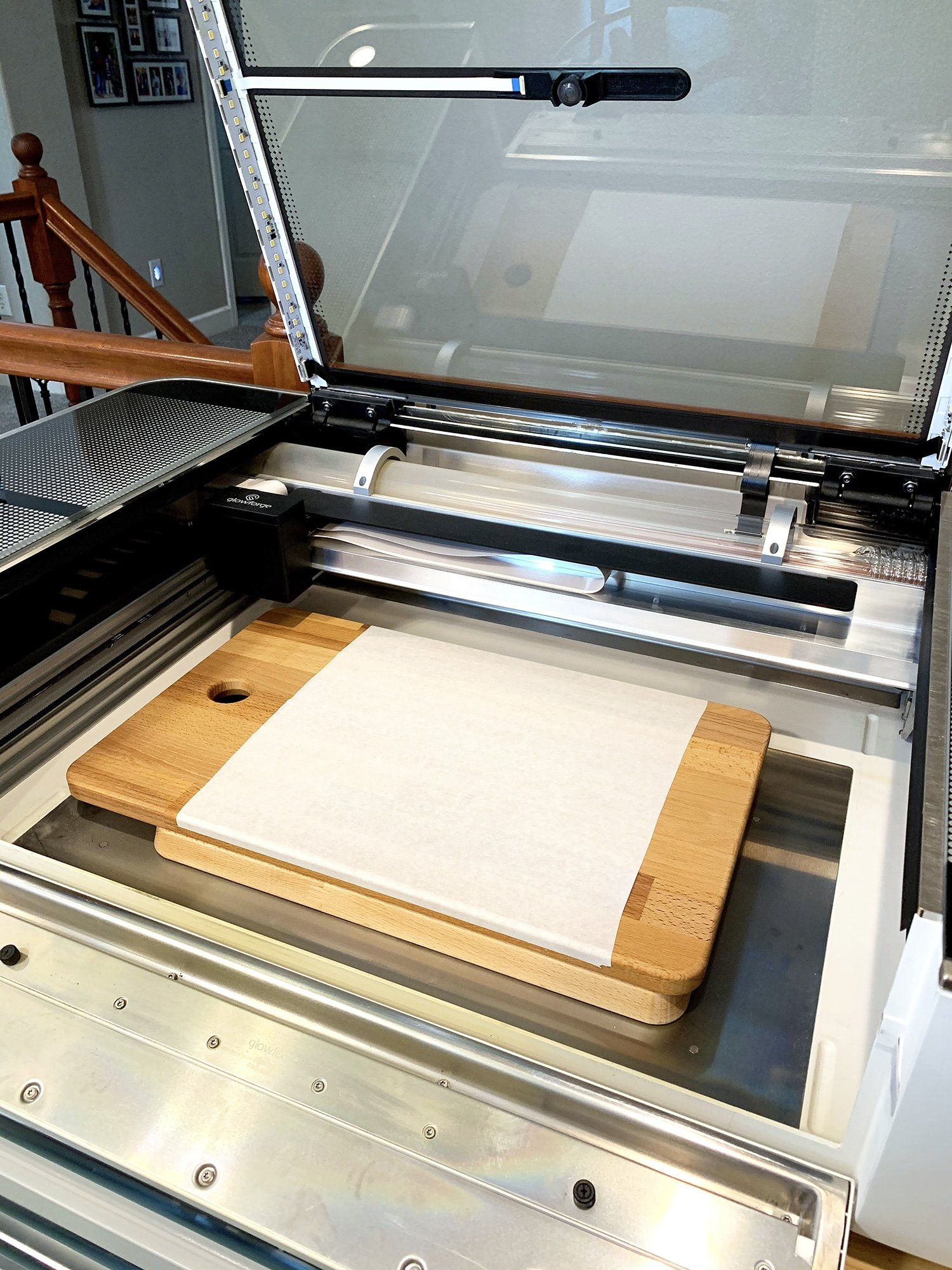 Open Glowforge Machine with Masked Cutting Board and Side Lowered