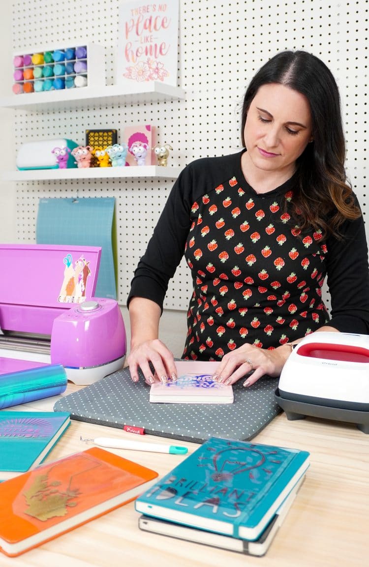 heidi making a journal using her cricut machine