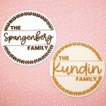 two custom engraved family name signs