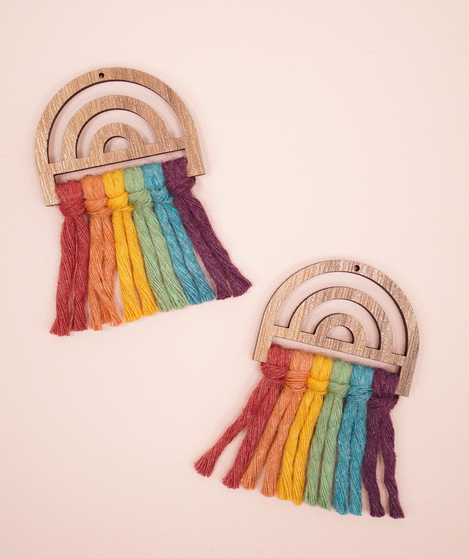 Unbrushed Rainbow Macrame Earrings in Wood Frames on peach background