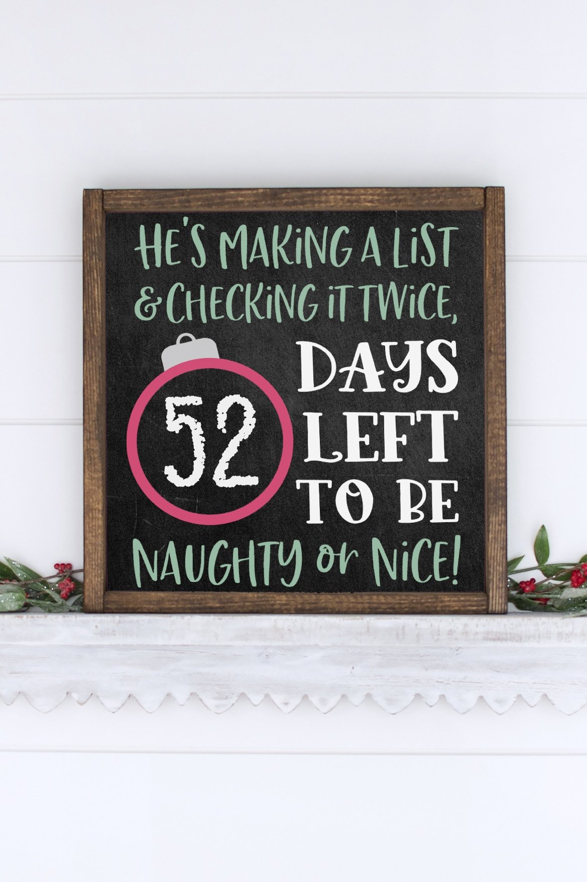 chalkboard christmas countdown sign on mantel