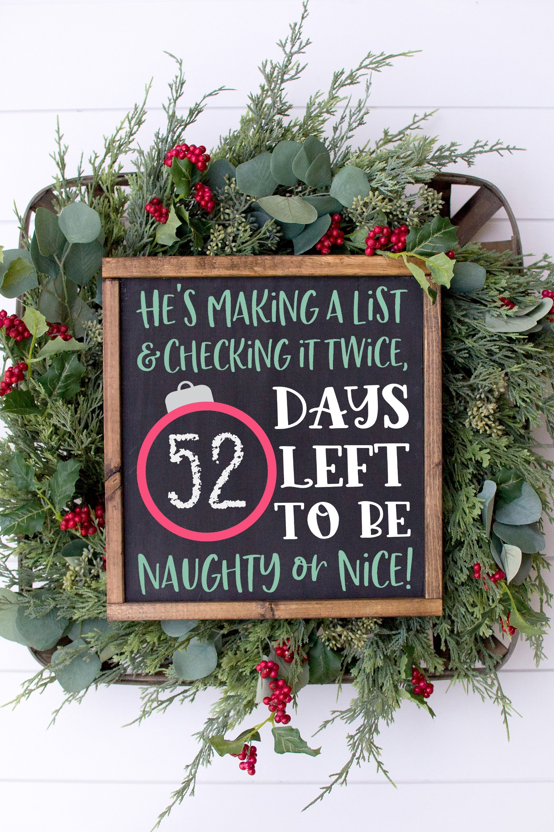 christmas countdown sign on christmas wreath
