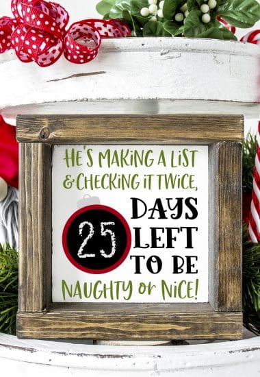 christmas countdown on wooden sign in christmas decorations