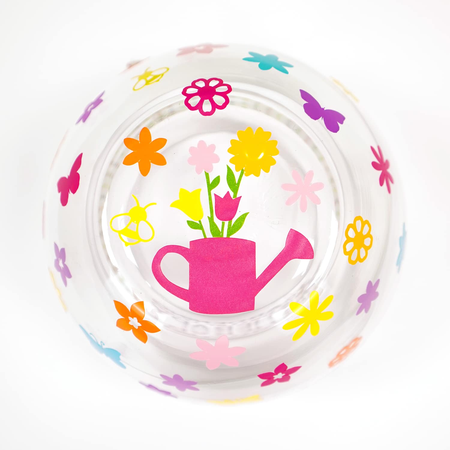 Inside of garden themed wine glass - watering can and floral decals on white background