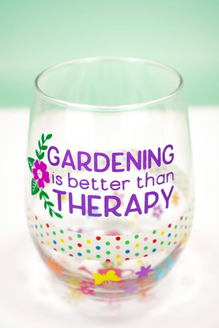 Adding vinyl decals to a "Gardening is Better Than Therapy" wine glass