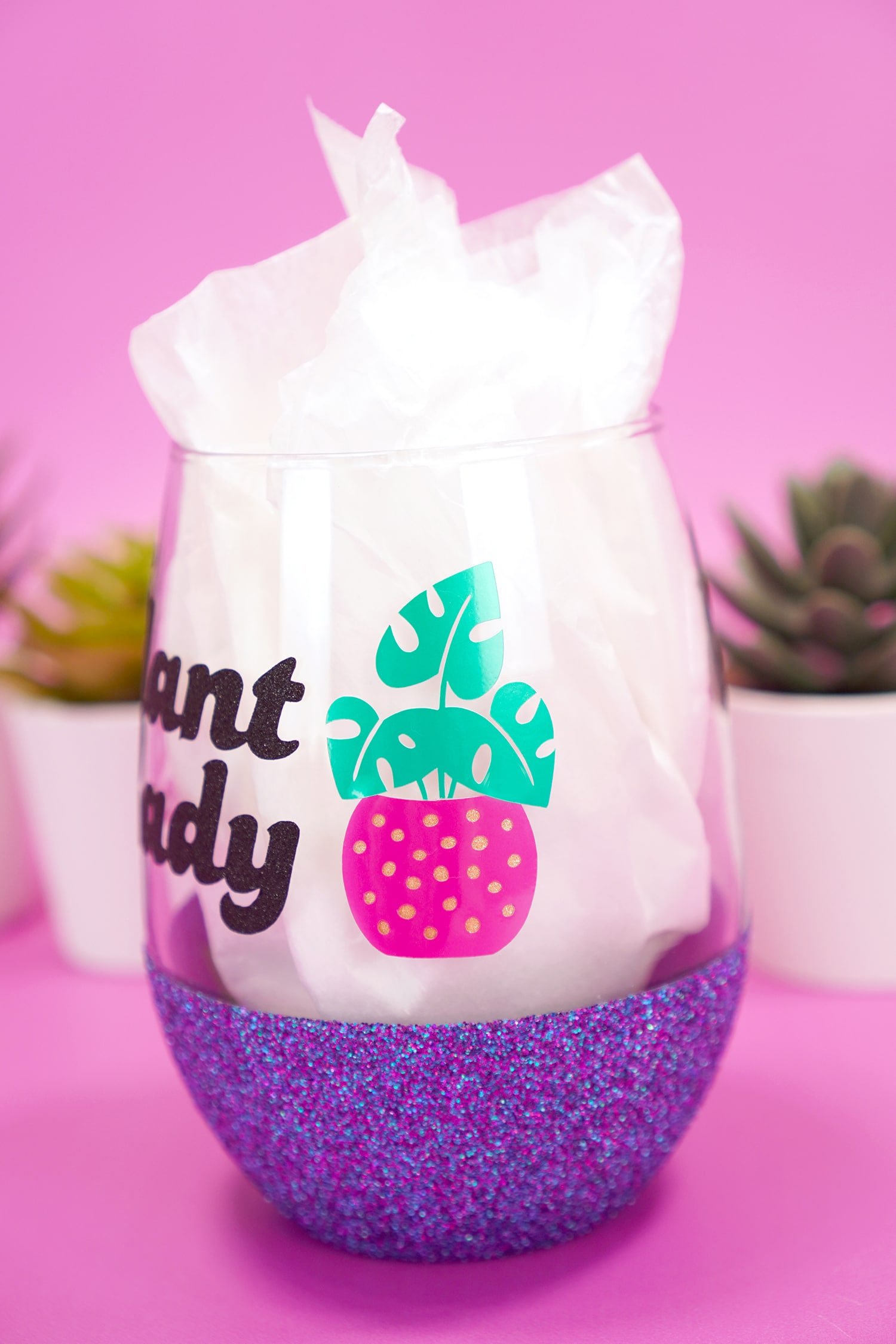 Vinyl plant decal on "Plant Lady" stemlesss glitter wine glass on purple background