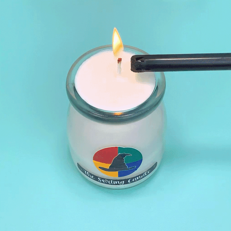 Animated GIF of white candle burning to reveal green color inside