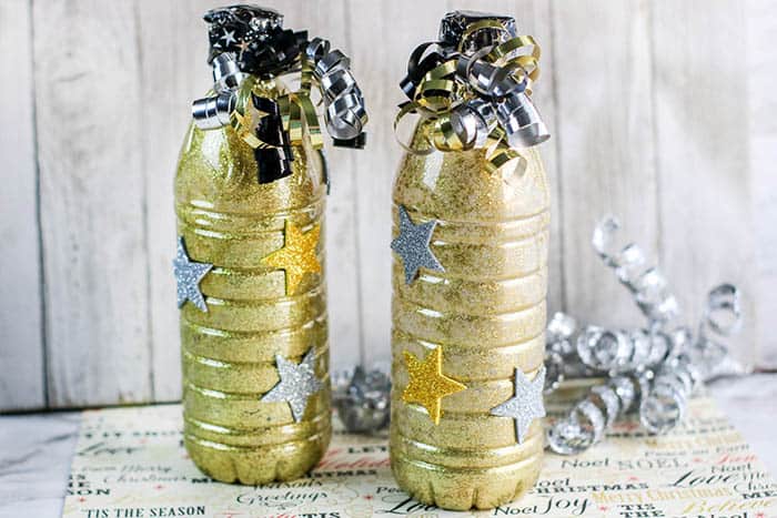new years gold glittery noisemakers made from water bottles