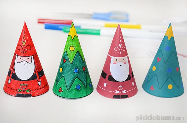 paper cone christmas decorations on table