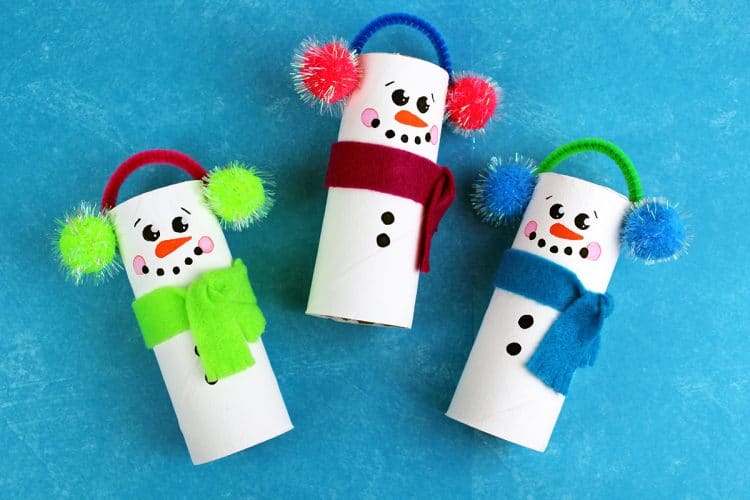snowmen made from toilet paper roll tubes with pipe cleaner ear muffs