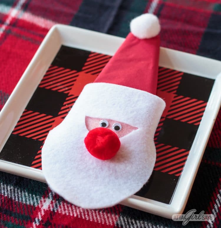 santa napkin ring holders on table