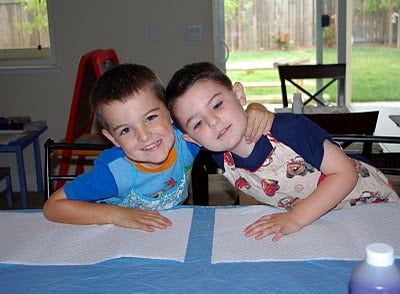 two boys at a table