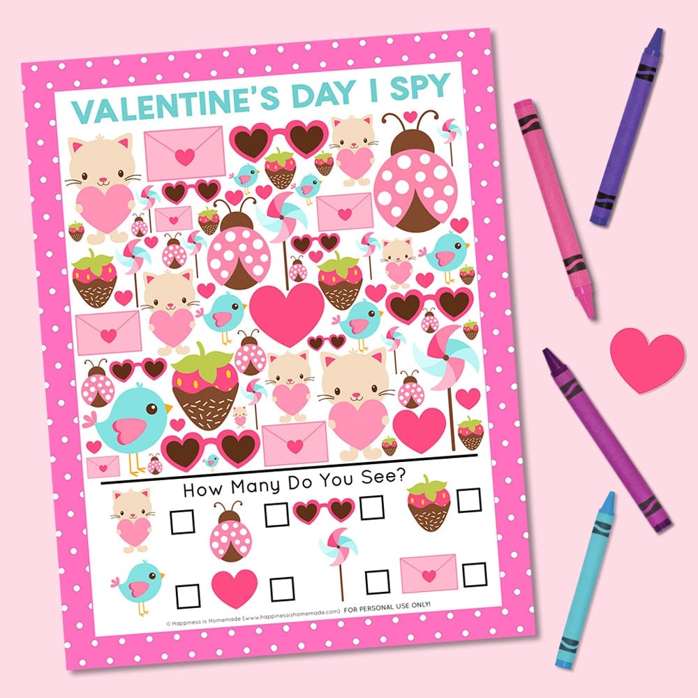 Valentine Printable I Spy Game on pink background with four crayons and heart