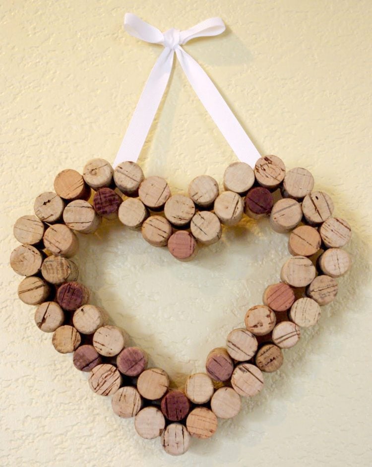 heart made from wine corks hanging with white ribbon